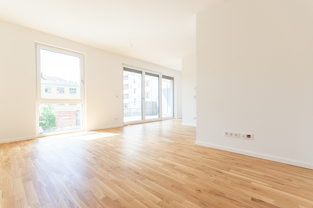 Single-Apartment mit großem Südbalkon | Offene Küche | Fußbodenheizung | Parkett | Keller