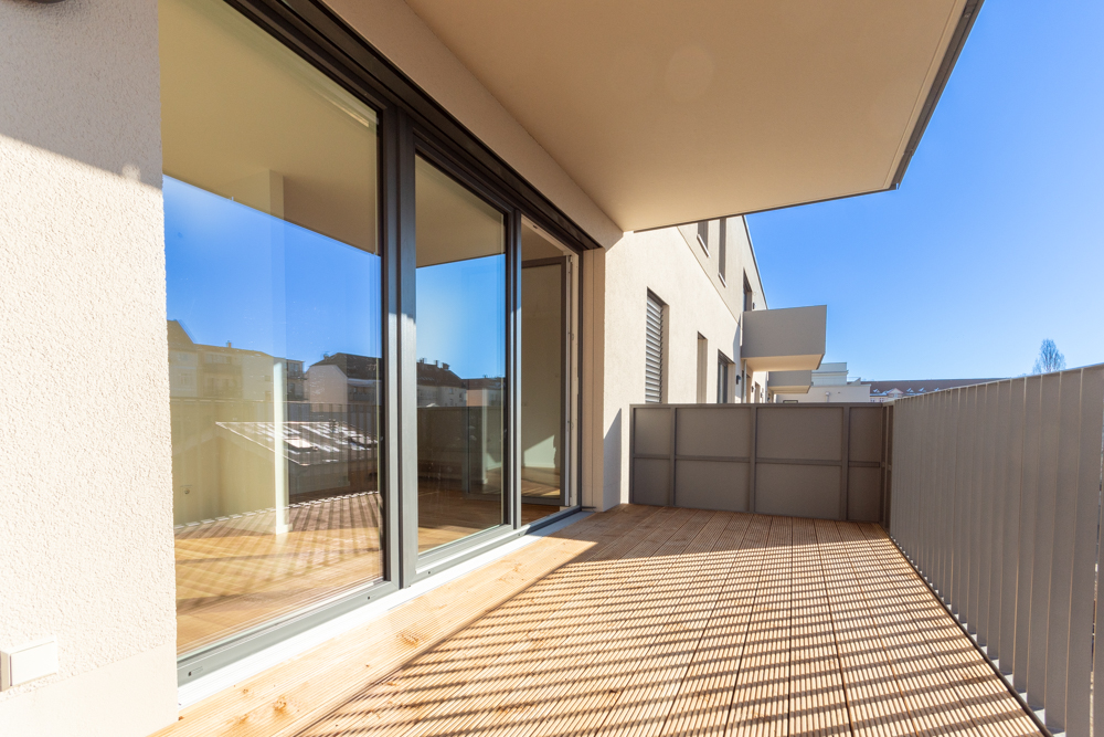 Single-Apartment mit großem Südbalkon | Offene Küche mit Einbauküche | Fußbodenheizung | Parkett