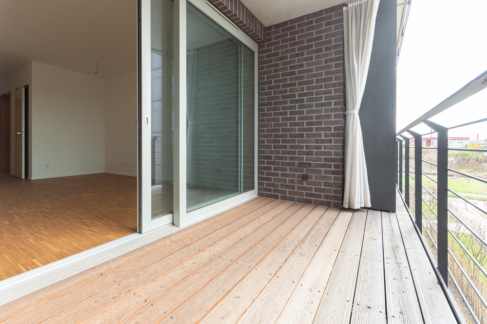 Wasserblick inklusive – Wohngenuss auf 50 m² | Balkon | Offene Küche | HWR | Bad mit Dusche | Aufzug
